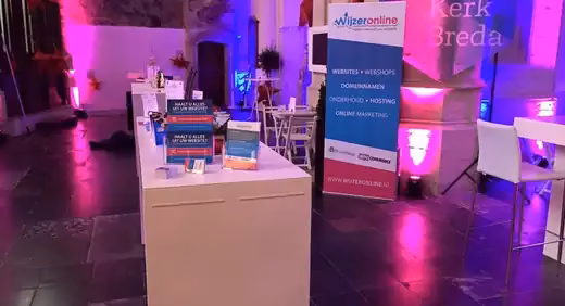 Stand van Wijzeronline op Bourgondisch Breda in de Grote Kerk